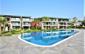 New two-bedroom apartment in a guarded beachfront residence with a swimming pool, Kadikalesi, Turkey for $337,000