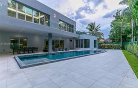 Modern villa with a plot, a pool and a terrace, Miami, USA for $2,999,000