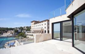 Three-storey new villa with a swimming pool and parking right on the water in Cas Catala, Mallorca, Spain for 11,500,000 €