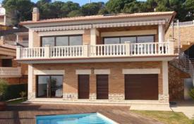 Modern villa with a swimming pool, a panoramic sea view and a parking close to the beach, Lloret de Mar, Spain. Price on request