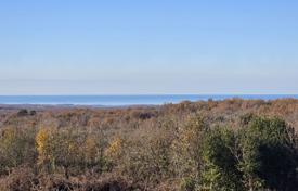 ISTRIA, VIŠNJAN — Land with a project and a view of the sea and nature for 270,000 €