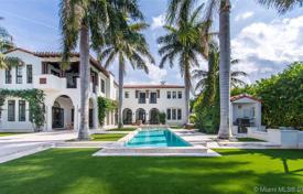 Spacious villa with a backyard, a swimming pool, a summer kitchen, a seating area, a terrace and three garages, Miami Beach, USA for 12,753,000 €