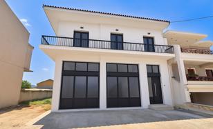 Two-storey house with a commercial space in Agia Triada, Peloponnese, Greece. Price on request