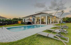 Comfortable villa with a backyard, a swimming pool, a patio, a terrace and a garage, Miami, USA for $1,875,000