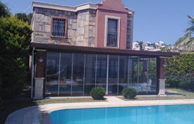 4+1 detached villa with private pool in Gundogan Bay and city view! for 1,193,000 €