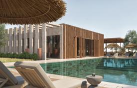 Sea view villas in Bodrum under construction in a complex with a swimming pool, a restaurant, a private beach and a pier for $2,350,000