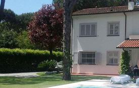 Two-storey villa with a swimming pool and a garden at 500 meters from the sea, Forte dei Marmi, Italy. Price on request