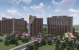 Modern residences in a vibrant complex, steps from the beach in Tömük, Mersin for $85,000