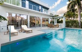 Modern villa with a patio, a pool, a terrace and a bay view, Miami Beach, USA for $4,750,000