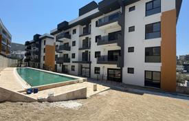 Newly-Built Apartments in a Complex with Pool in Kuşadası for $156,000
