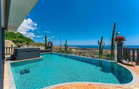 Three-level furnished villa with a pool and ocean views in Adeje, Tenerife, Spain for 3,710,000 €