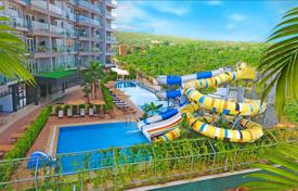 Residence with swimming pools, an aquapark and a spa center at 80 meters from the sea, Mersin, Turkey for From $100,000