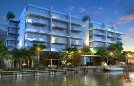 Elegant apartments with terraces and views of the canal and the city in a residence with a pool, lounges and a marina, Bay Harbor Islands for $1,688,000