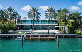 Modern villa with a garden, a backyard, a pool, a relaxation area, terraces and a garage, Miami Beach, USA for $25,900,000