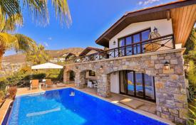 Cozy villa with a swimming pool and a pier in a quiet area, 100 meters from the sea, Kalkan, Turkey for 8,000 € per week