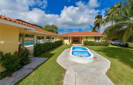 Spacious villa with a backyard, a swimming pool, a recreation area and a garage, Miami Beach, USA for $10,800,000