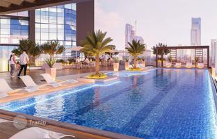 High-rise residential complex with city views, close to the highway, Majan, Dubai, UAE for From $267,000