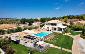 Luxury villa with a pool, a landscaped garden and a guest apartment in Peloponnese, Greece for 1,500,000 €