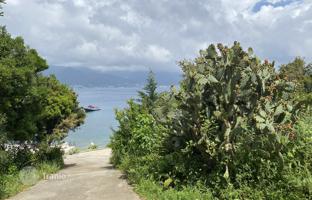 Building plot by the sea with two houses, Krasici, Tivat, Montenegro for 1,199,000 €