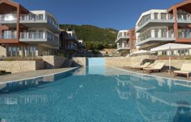 Furnished apartment with a parking, a plot, a terrace and a sea view, in a residential complex with a swimming pool, Djenovici, Montenegro for 219,000 €