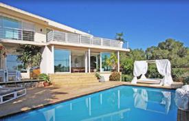 Two-level villa with a pool and a garden in Cap Martinet, Ibiza, Spain for 8,300 € per week
