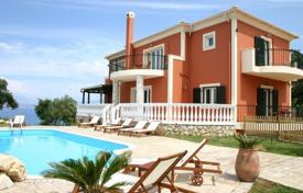 Two-storey villa 50 meters from the beach with a boat dock, Kassiopi, Corfu, Greece. Price on request