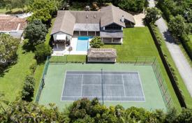 Bright villa with a garden, a backyard, a pool, a relaxation area, a terrace and a garage, Miami, USA for $1,750,000