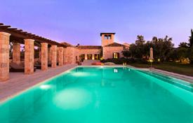 Stone beachfront villa with a swimming pool in a quiet picturesque villa, Porto Heli, Greece for 46,000 € per week