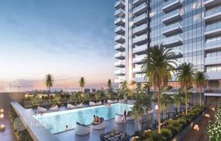 Luxury apartment with a balcony in the new residence Golf Gate 2 with swimming pools and a golf club, Damac Hills, Dubai, UAE for $543,000
