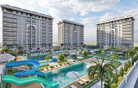 New apartments with different layouts in a residence with swimming pools, an aquapark and a spa area, Alanya, Turkey for $133,000