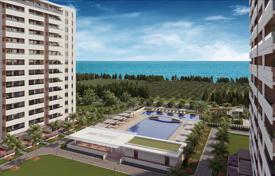 New residence with an aquapark, swimming pools and a tennis court at 150 meters from the beach, Mersin, Turkey for From 95,000 €