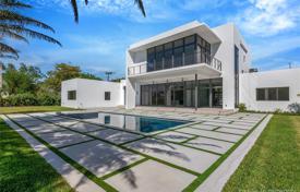 Modern villa with a backyard, a swimming pool, a relaxation area, a terrace and a garage, Miami, USA for $2,449,000