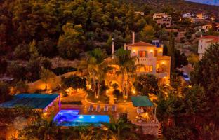 Three-storey villa with a pool and a garden near the sea in the Peloponnese, Greece for 1,450,000 €