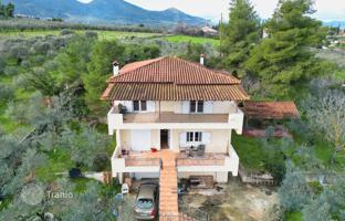 Furnished three-storey house with a large plot in Corinthia, Greece for 390,000 €