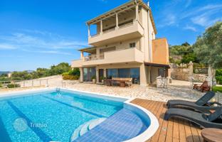 Three-level villa with a pool, garden, and beautiful sea views in Lefkada, Peloponnese, Greece for 1,350,000 €