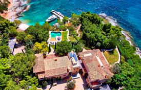 Luxury villa with a private secluded beach, a swimming pool and lounge areas, Porto Heli, Greece for 46,000 € per week
