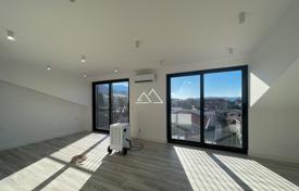 Apartment with 2 bedrooms in a new house with a pool in Tivat for 550,000 €