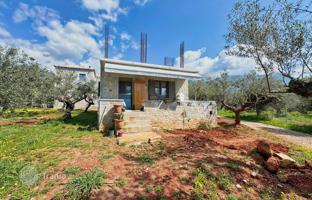 Stone house with a nice plot 1 km from the sea in the Peloponnese, Greece for 300,000 €